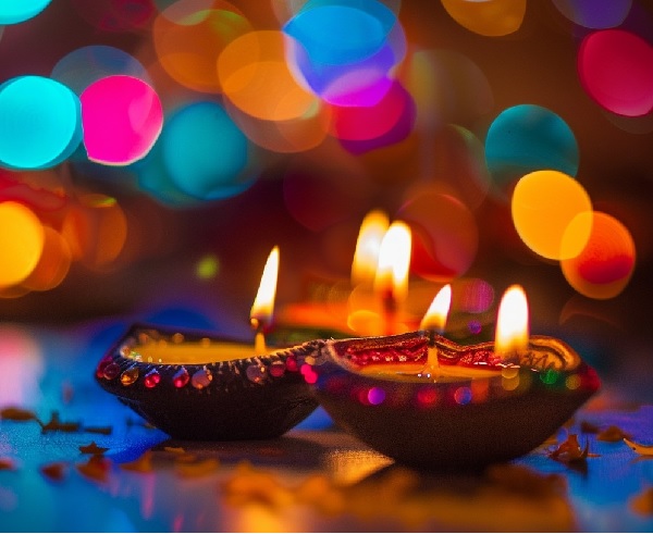 Diwali decorations with diyas, candles, and fireworks, showcasing festival of lights celebrations.